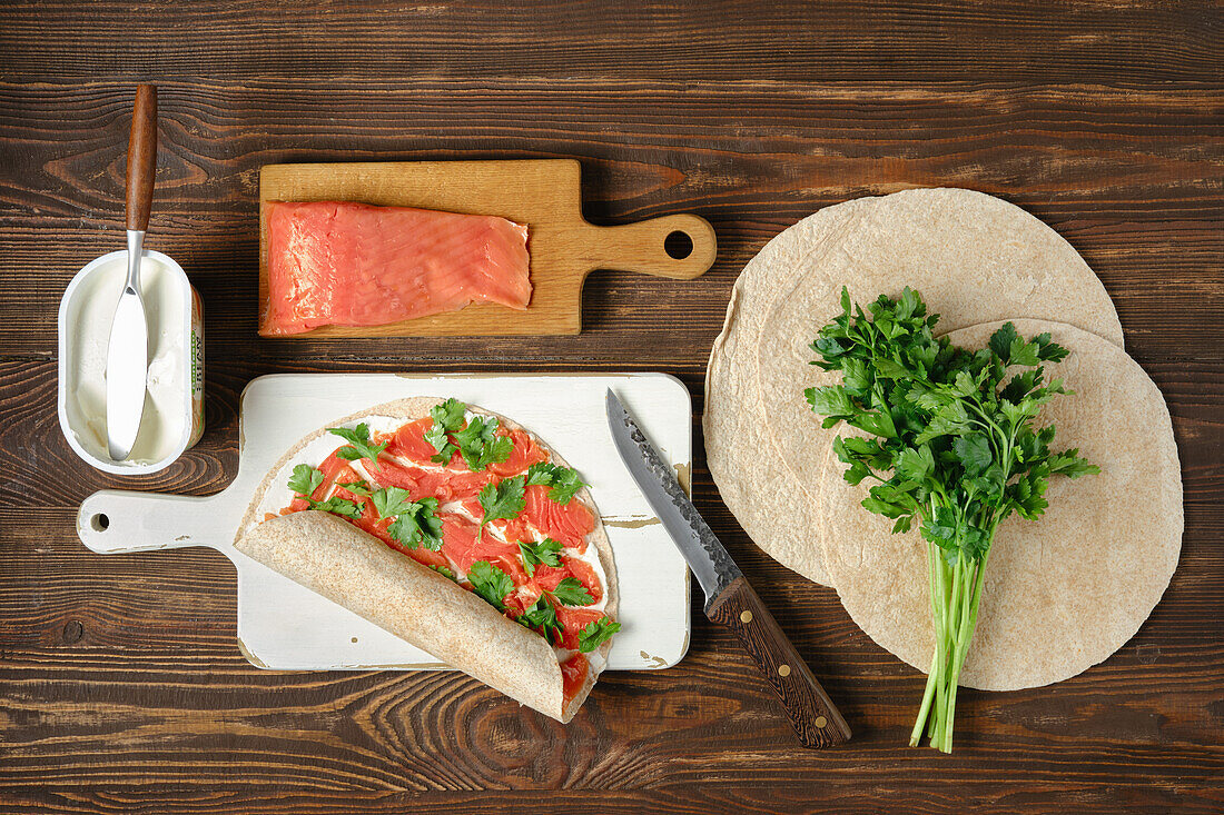 Wrap with cream cheese, smoked salmon and coriander