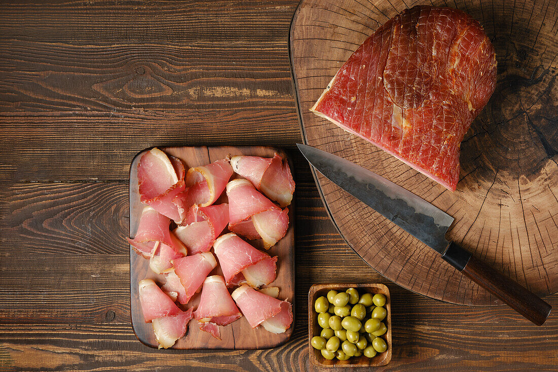 Prosciutto with green olives