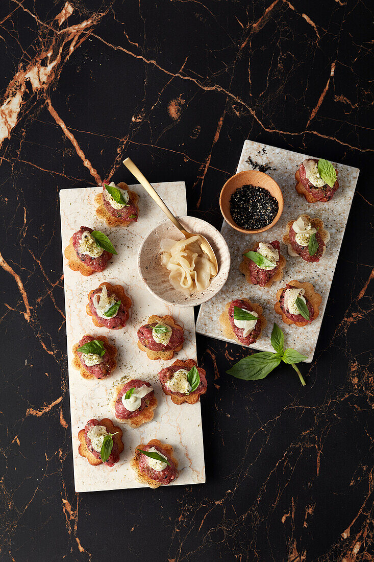 Crostini with Asian beef tartare and lime aioli