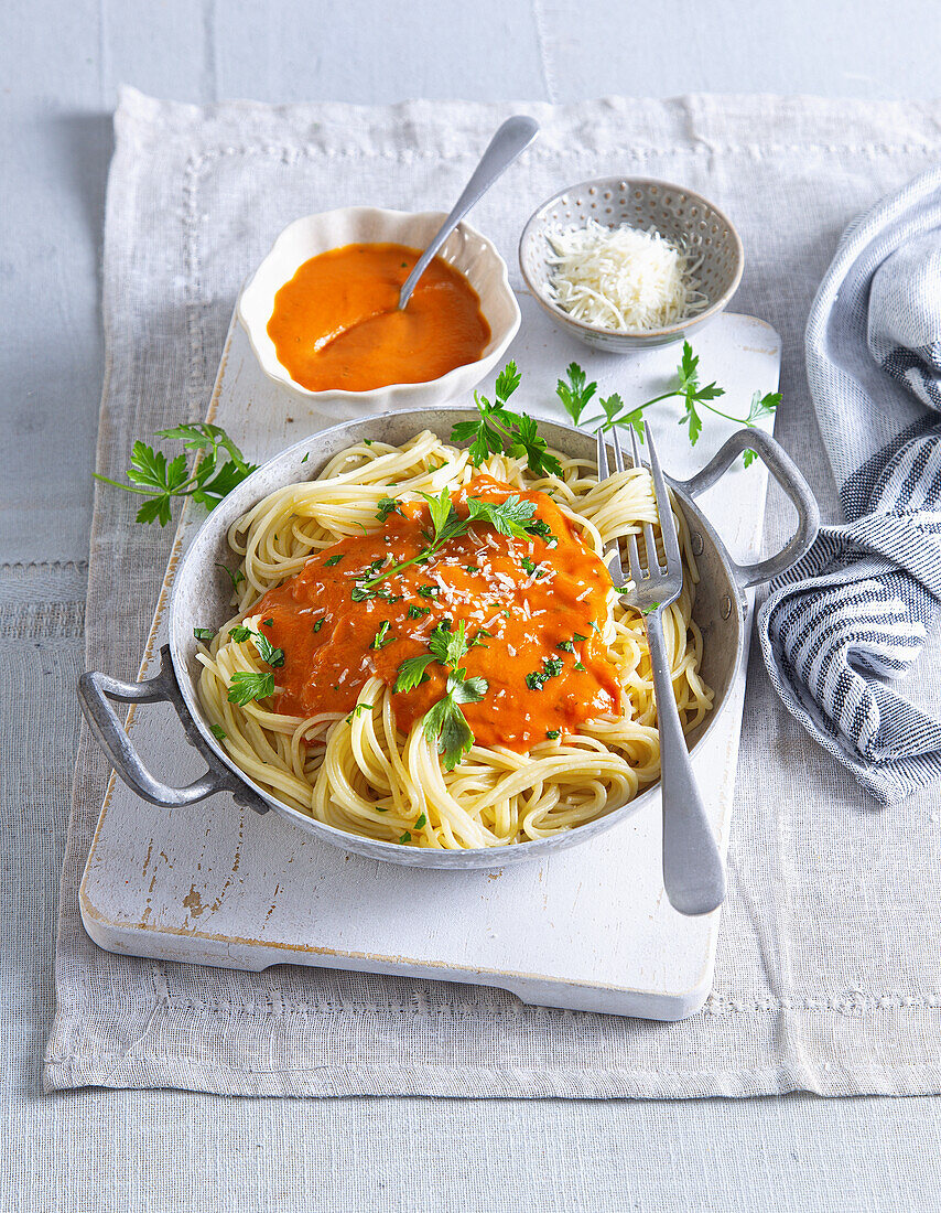 Spaghetti with tomato and cream sauce