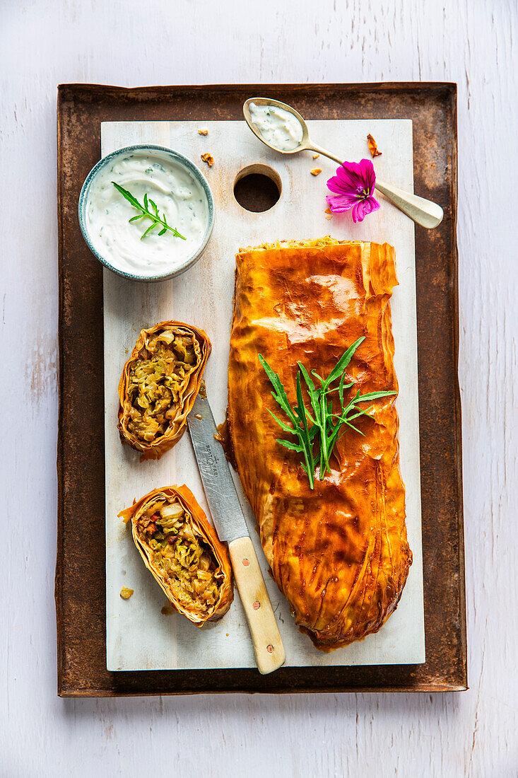 Cabbage strudel with sour cream dip