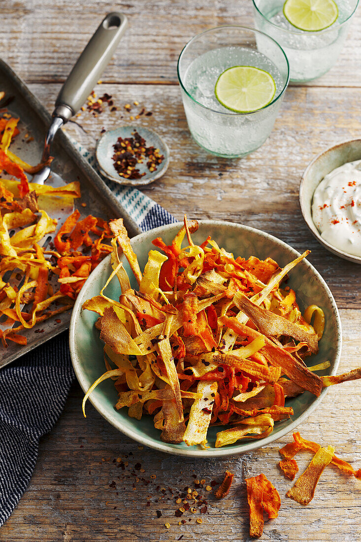 Chips made from vegetable peelings with yoghurt dip