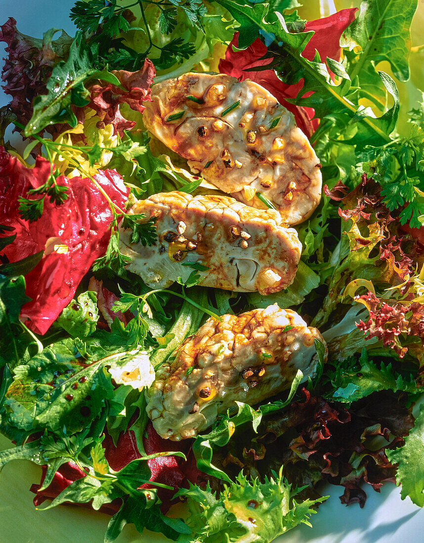 Leaf salad with roasted lamb brains and herbs