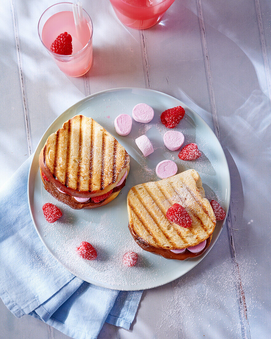 Grilled brioche sandwich with Nutella, marshmallows and raspberries