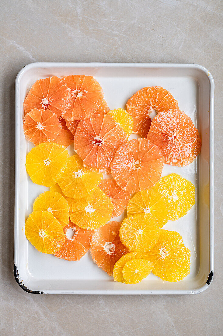 Slices of orange and pink grapefruit