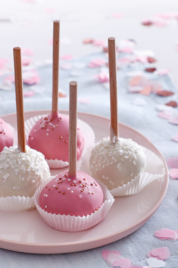 Almond ball lollipops with icing