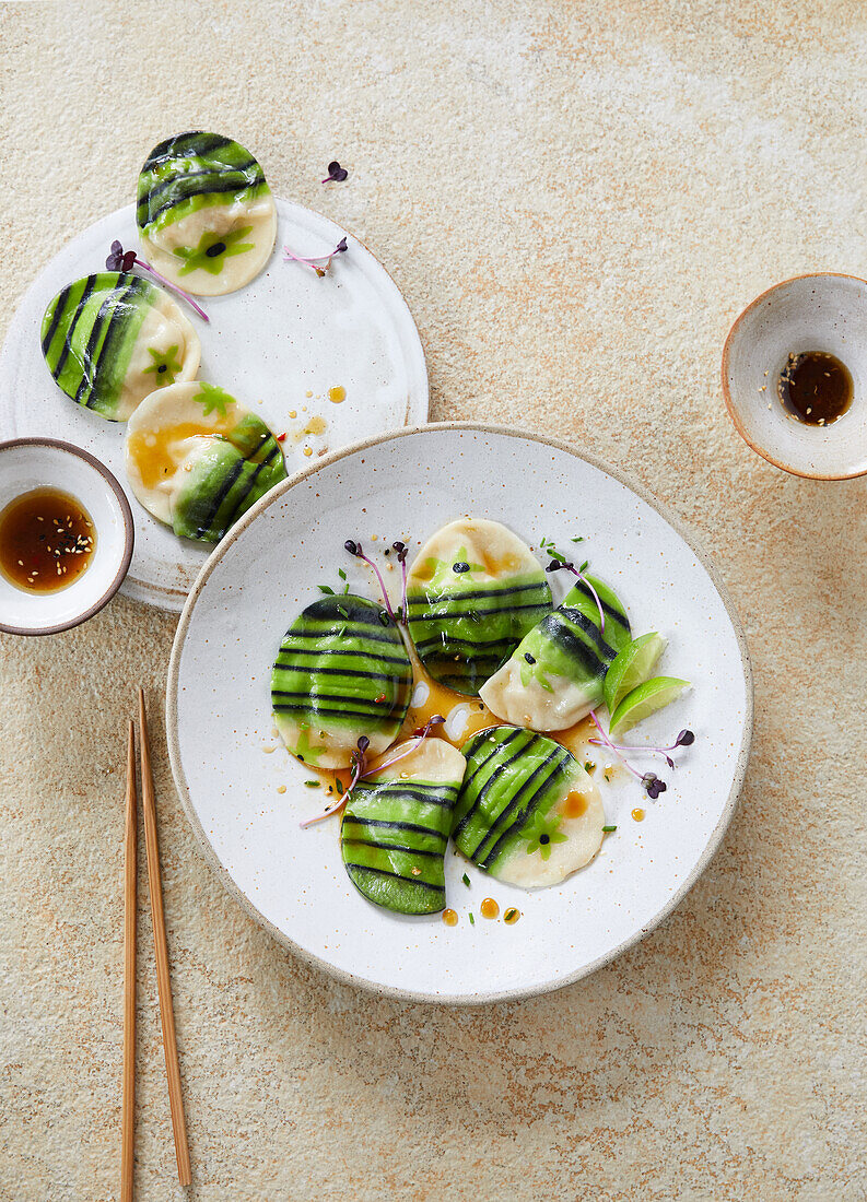 Striped ravioli with scampi filling