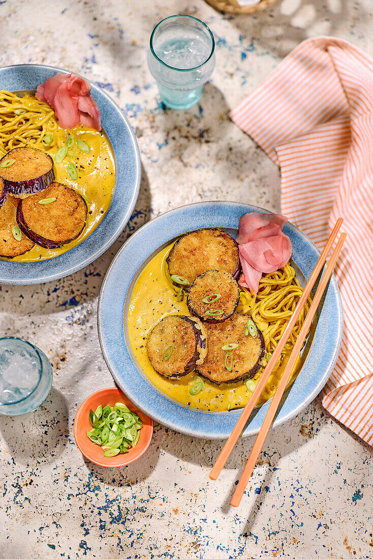 Japanese katsu noodles with eggplants, ginger and spring onions