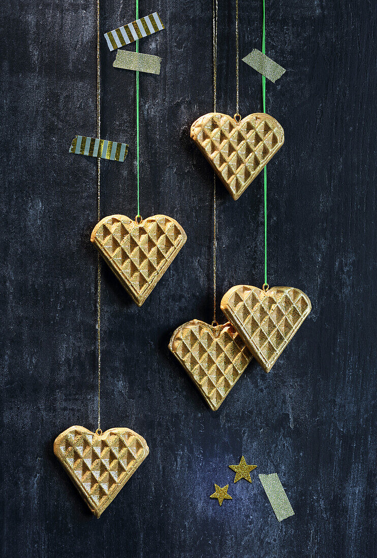 Waffle heart pendants made from modelling clay as Christmas decorations