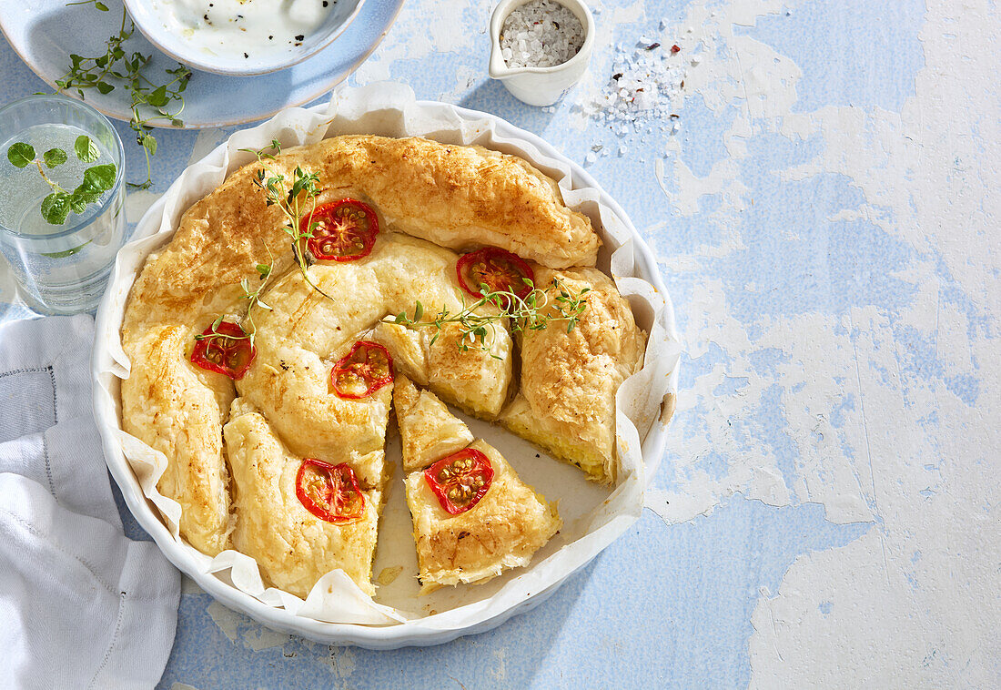 Banitsa (Bulgarian cheese pâté) with tomatoes and garlic