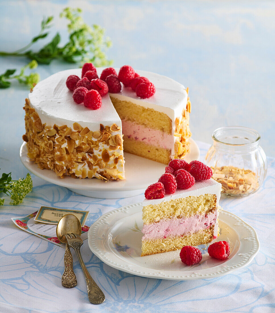 Almond tart with raspberries and whipped cream