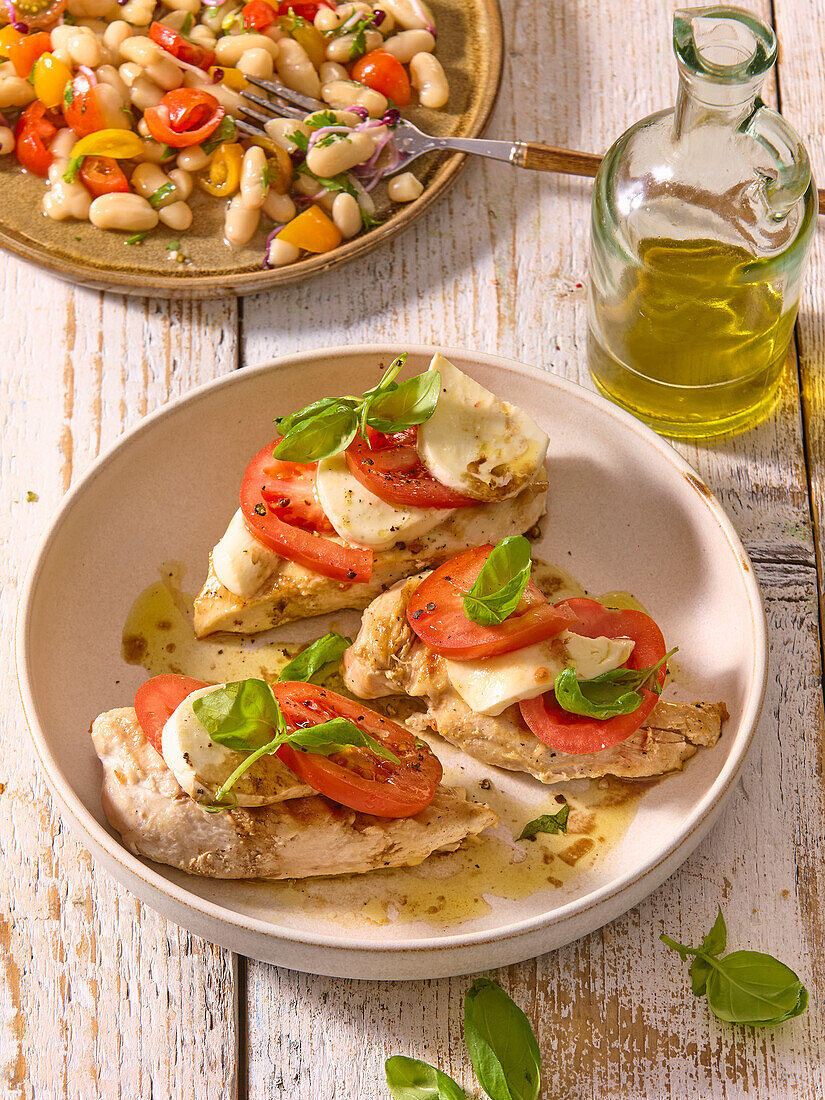 Chicken caprese with tomatoes, mozzarella and basil