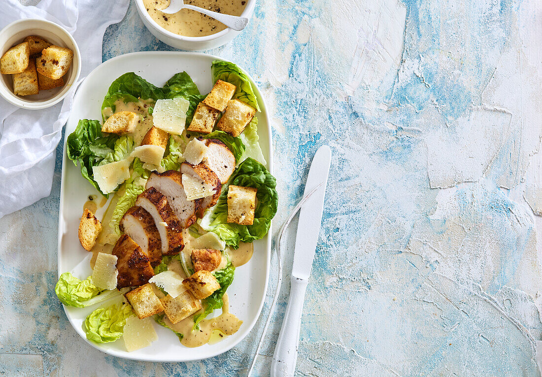 Chicken Caesar salad with croutons and parmesan