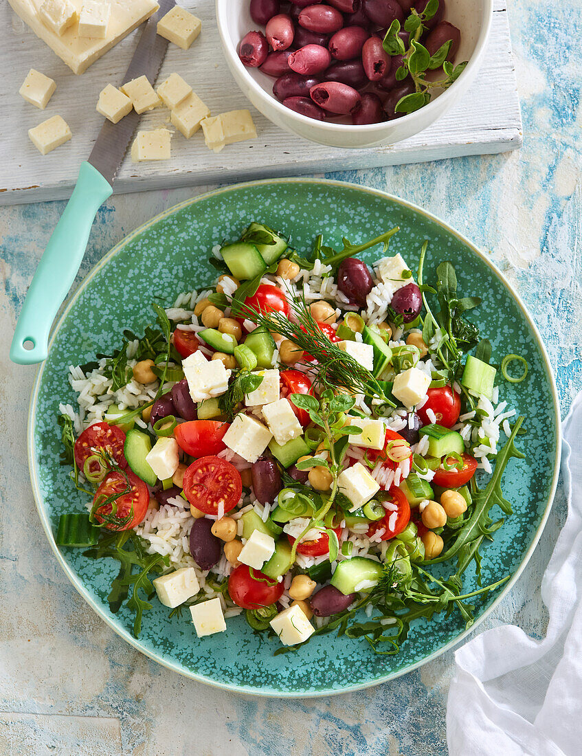 Greek salad with rice, feta and olives