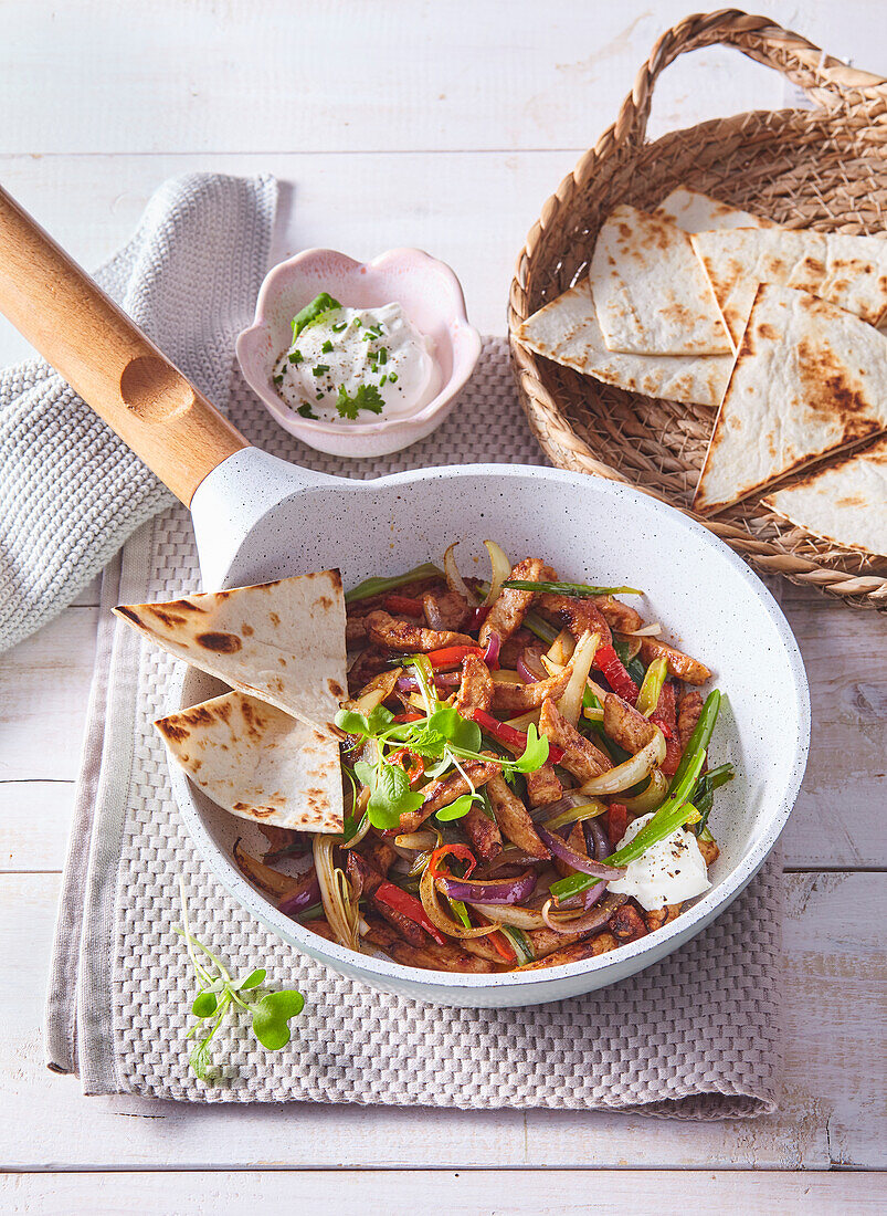 Pork gyros with vegetables and tortilla chips