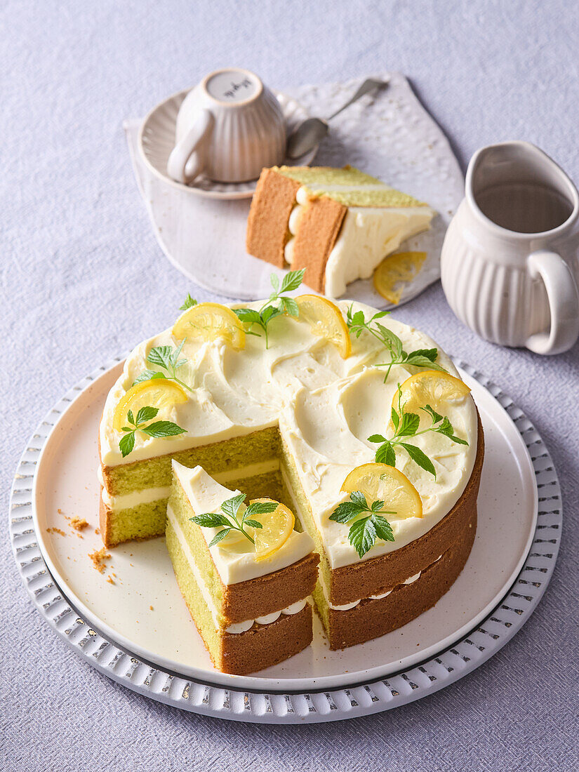 Cucumber cake with cream topping and lemons