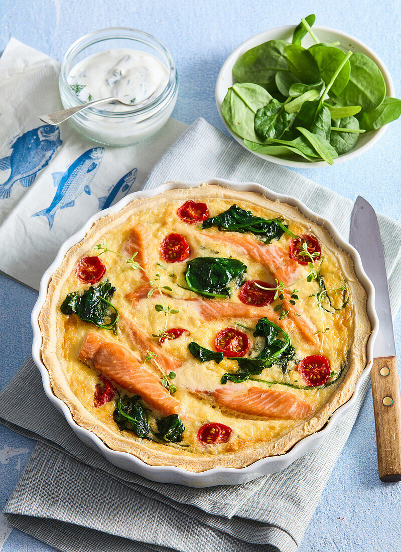 Salmon quiche with spinach and cherry tomatoes