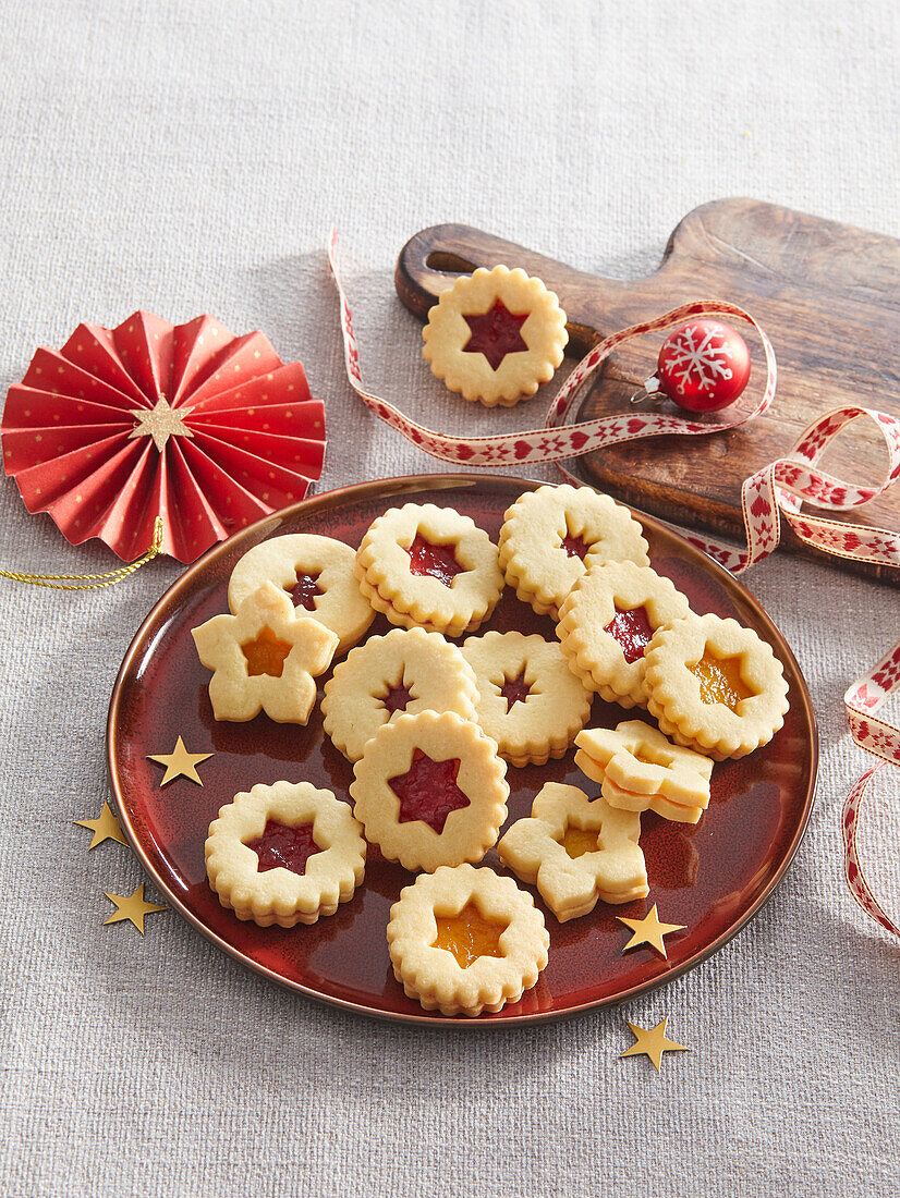 Linzer biscuits with redcurrant and apricot jam