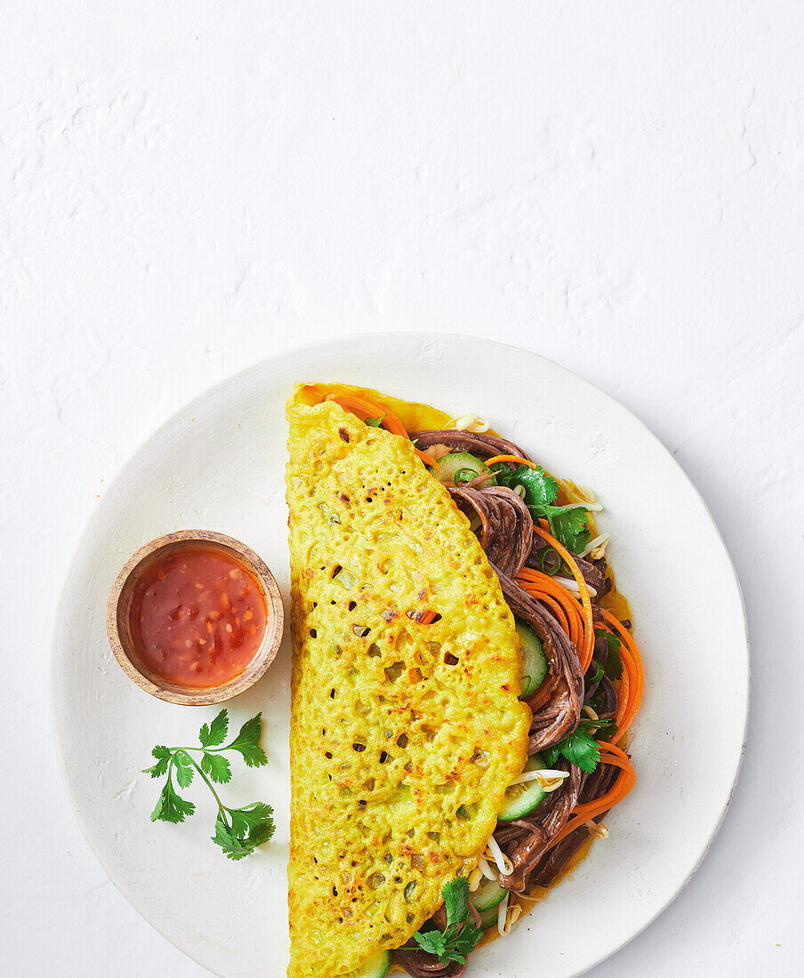 Crispy beef and coconut pancakes with dip