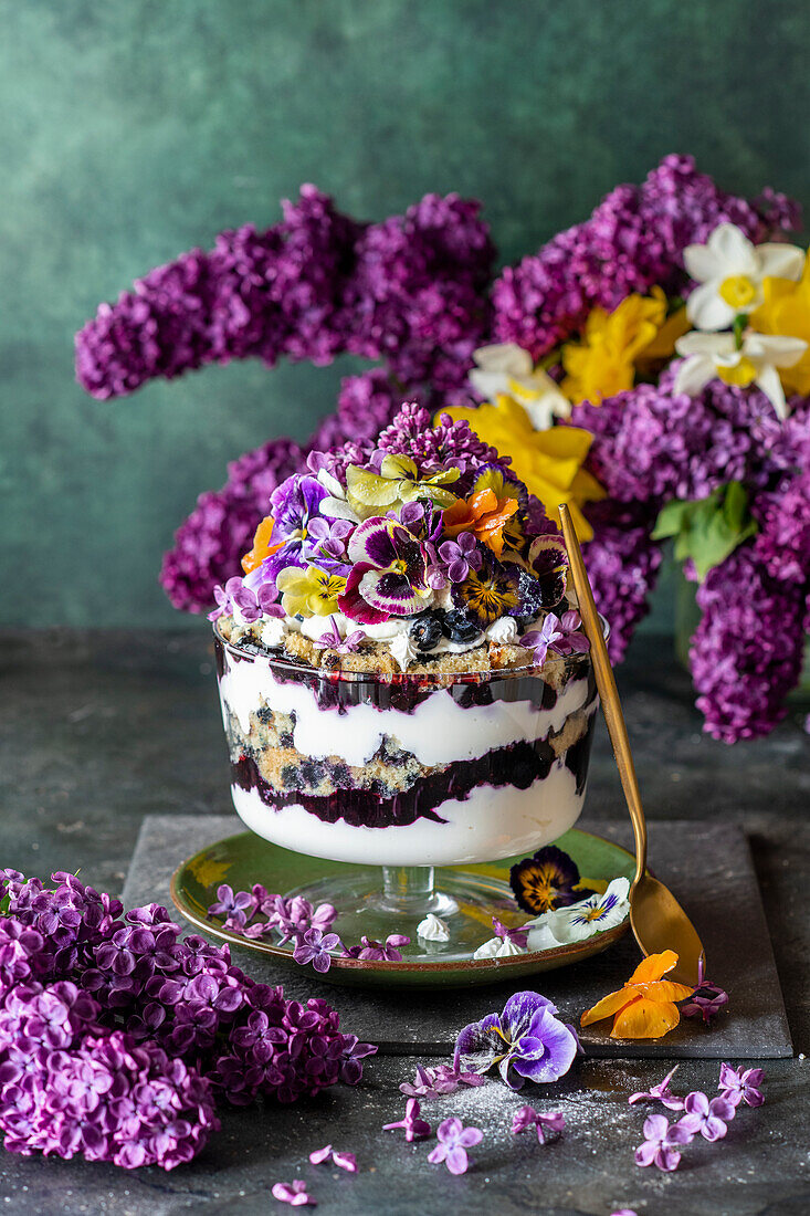 Blueberry trifle with edible flowers