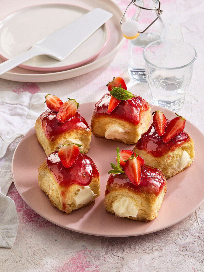 Yeast rolls with quark filling and strawberry glaze