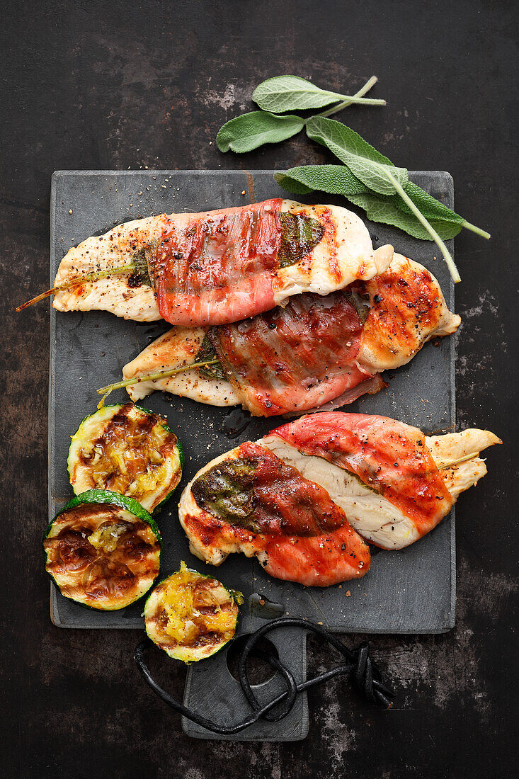 Grilled chicken saltimbocca and courgette slices