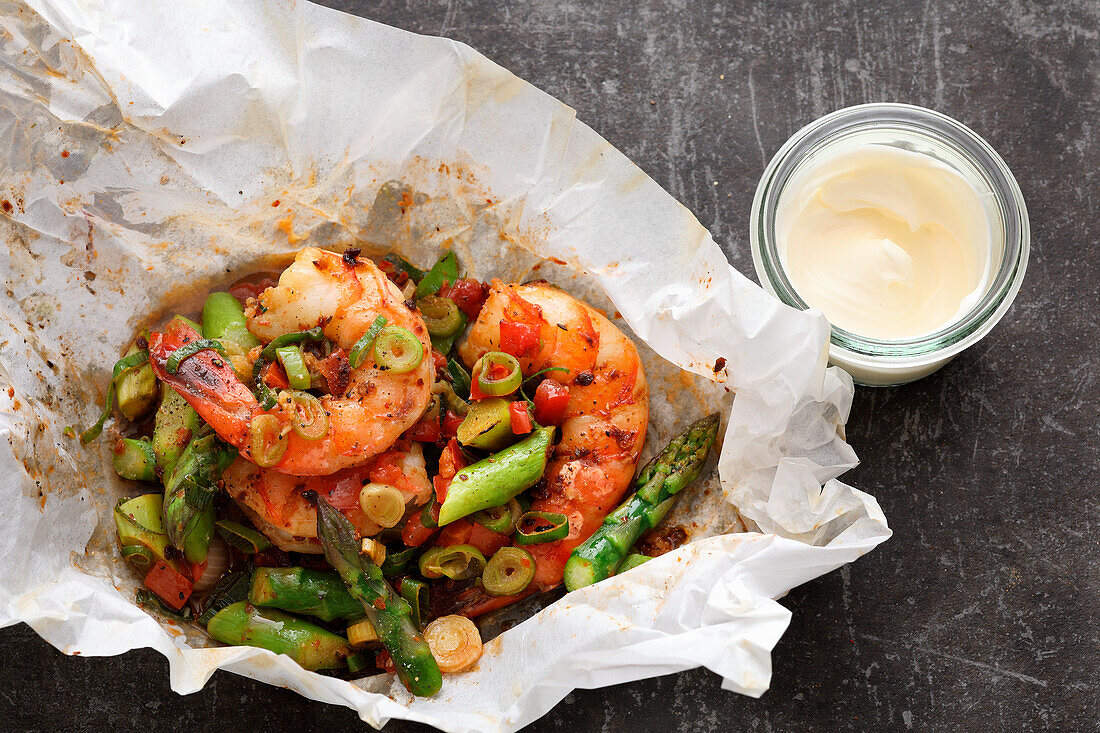 Grilled prawn and asparagus parcel