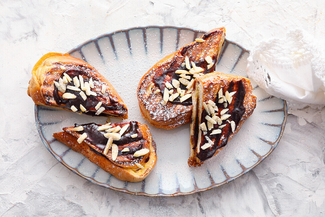 Grilled poor knights with plum jam and almonds