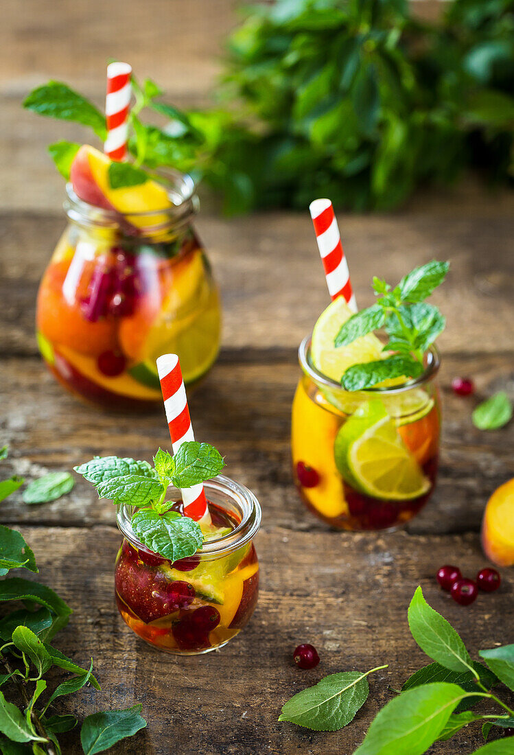 Summer fruit cocktail with lime and mint