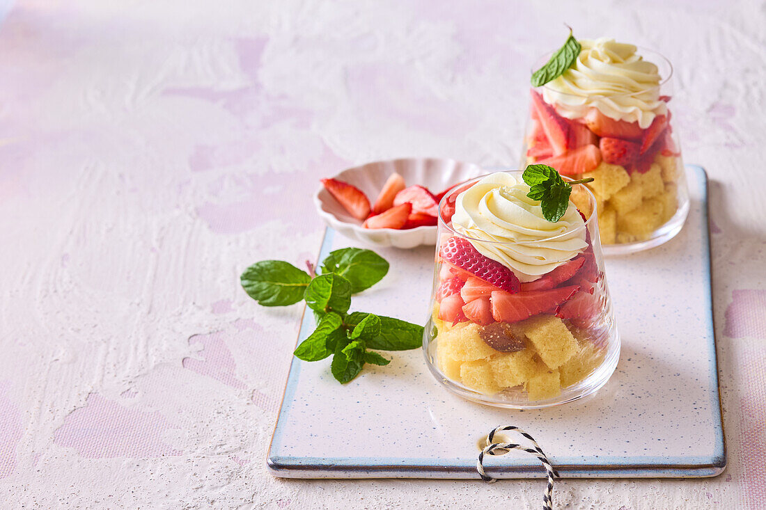 Strawberry sponge dessert in a glass