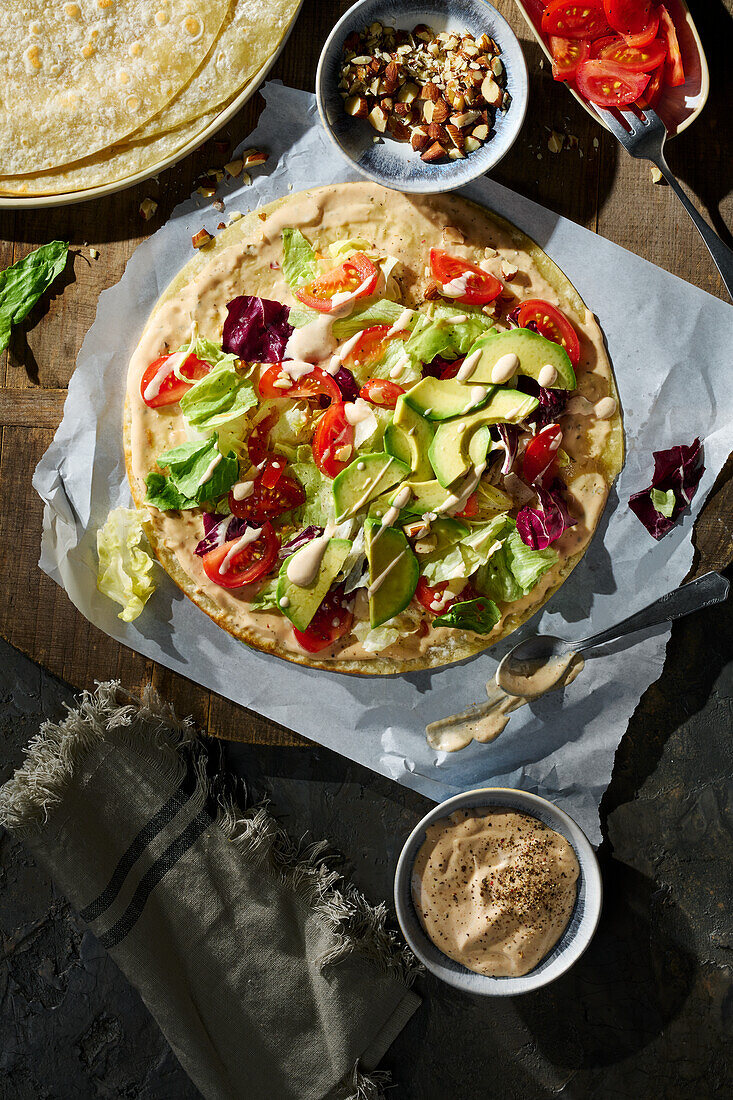 Vegetable wrap with radicchio, avocado, tomatoes and roasted almonds