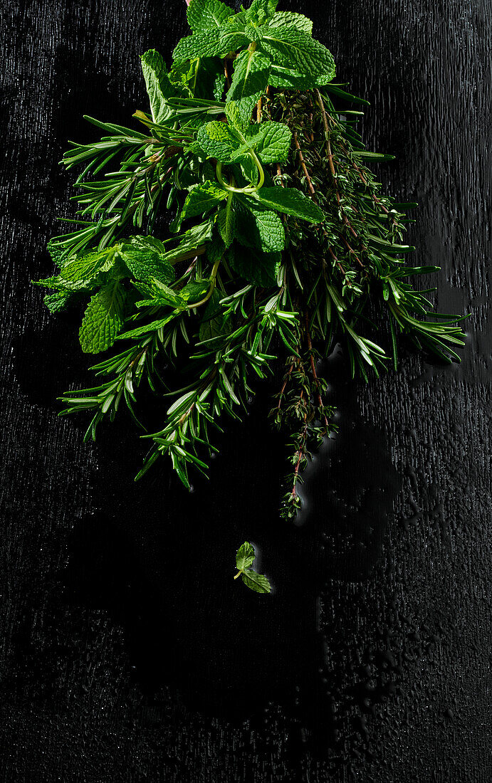 Mixed fresh herbs - rosemary, thyme, mint