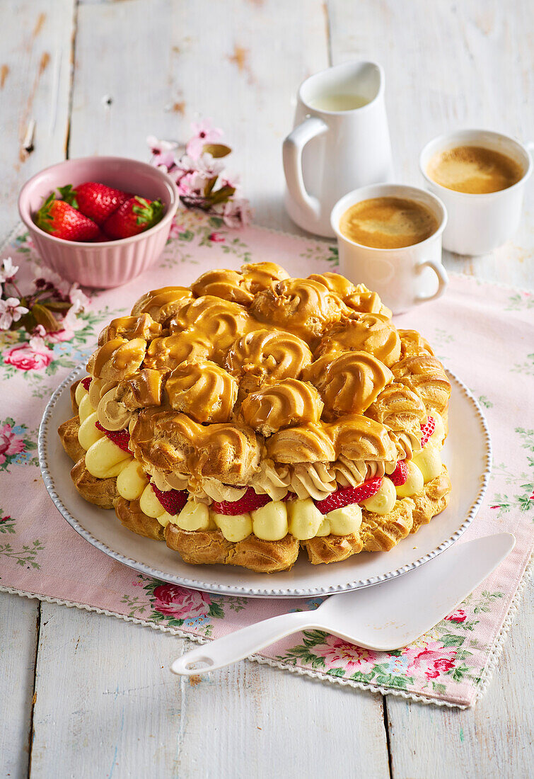 Cream puff cake with custard cream and strawberries