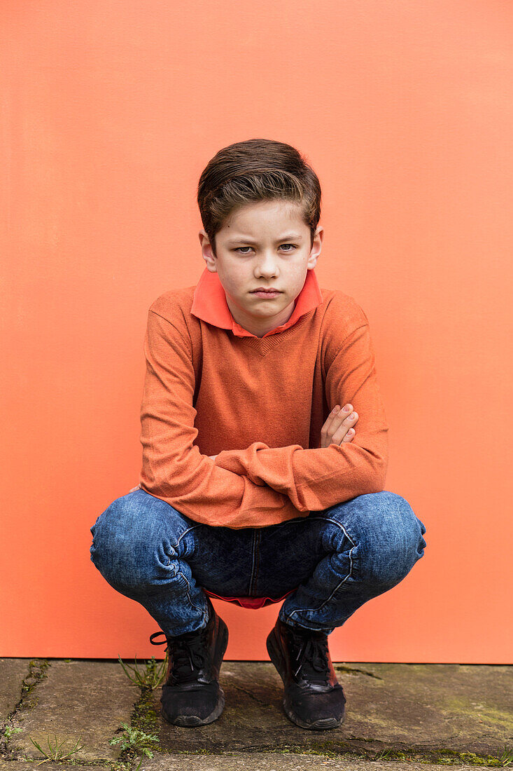 Portrait of Young Boy Crouching