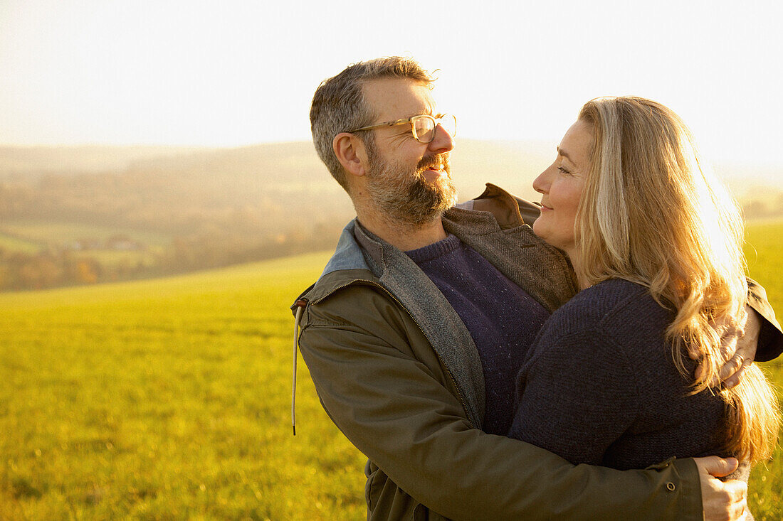 Couple Hugging in a Field