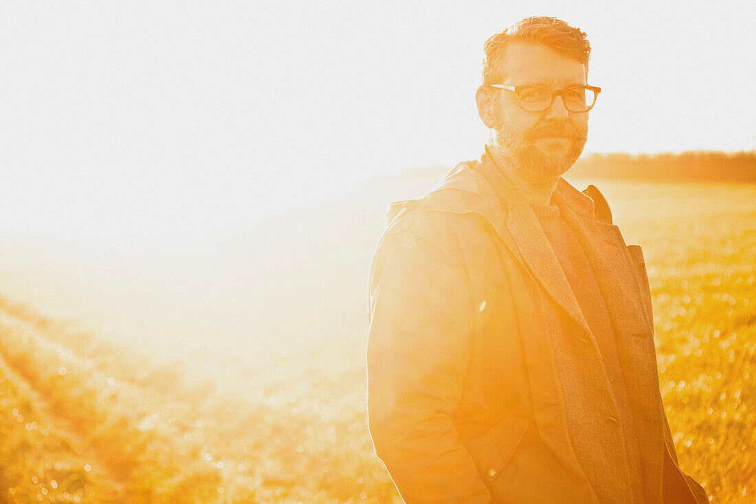 Man Standing in a Field