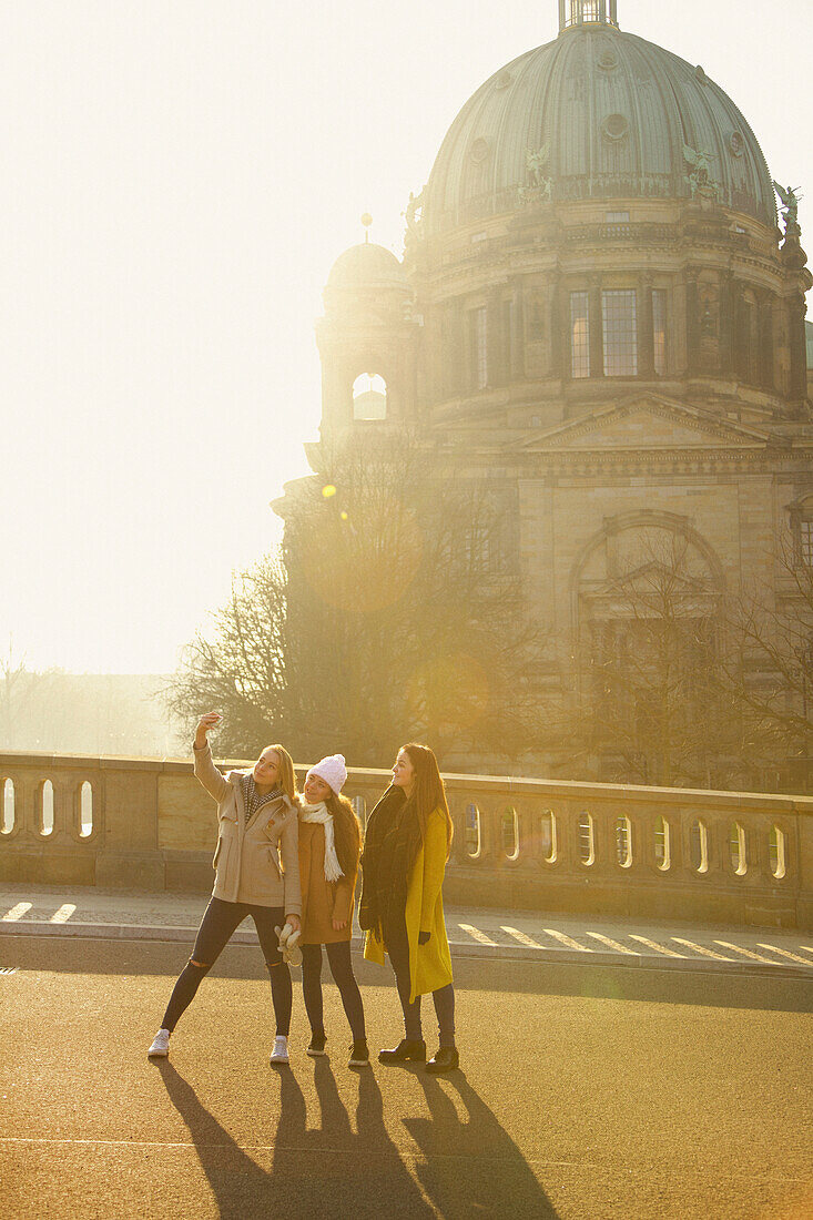 Teenage Girls Taking Selfie in front of Berlin Cathedral