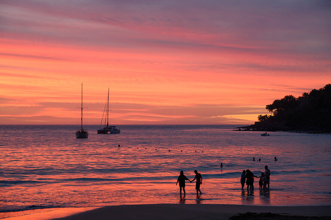 Beach and boats at sunset, Chacala, Nayarit, Mexico.