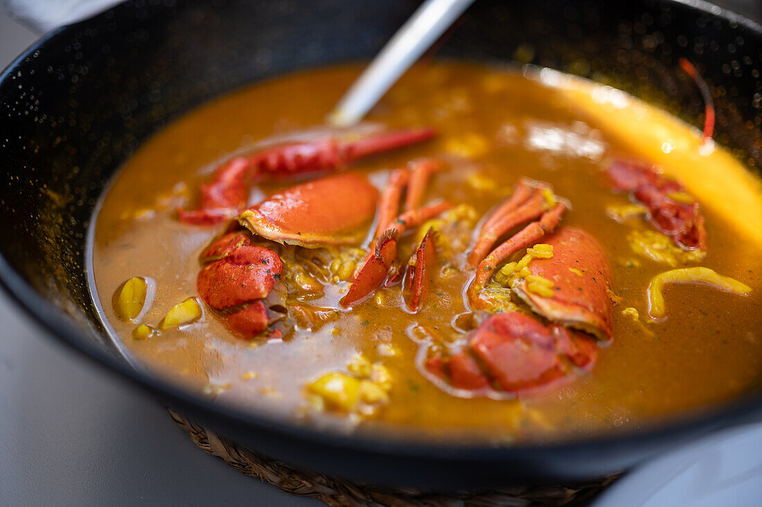 Rice casserole with lobster in restaurant, Peñiscola, Castellon, Valencian Community, Spain