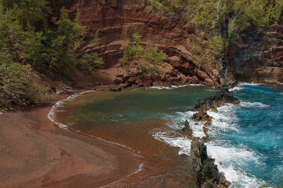 Kaihalulu Beach, AKA Red Sand Beach, on the Hana Coast of Maui, Hawaii.