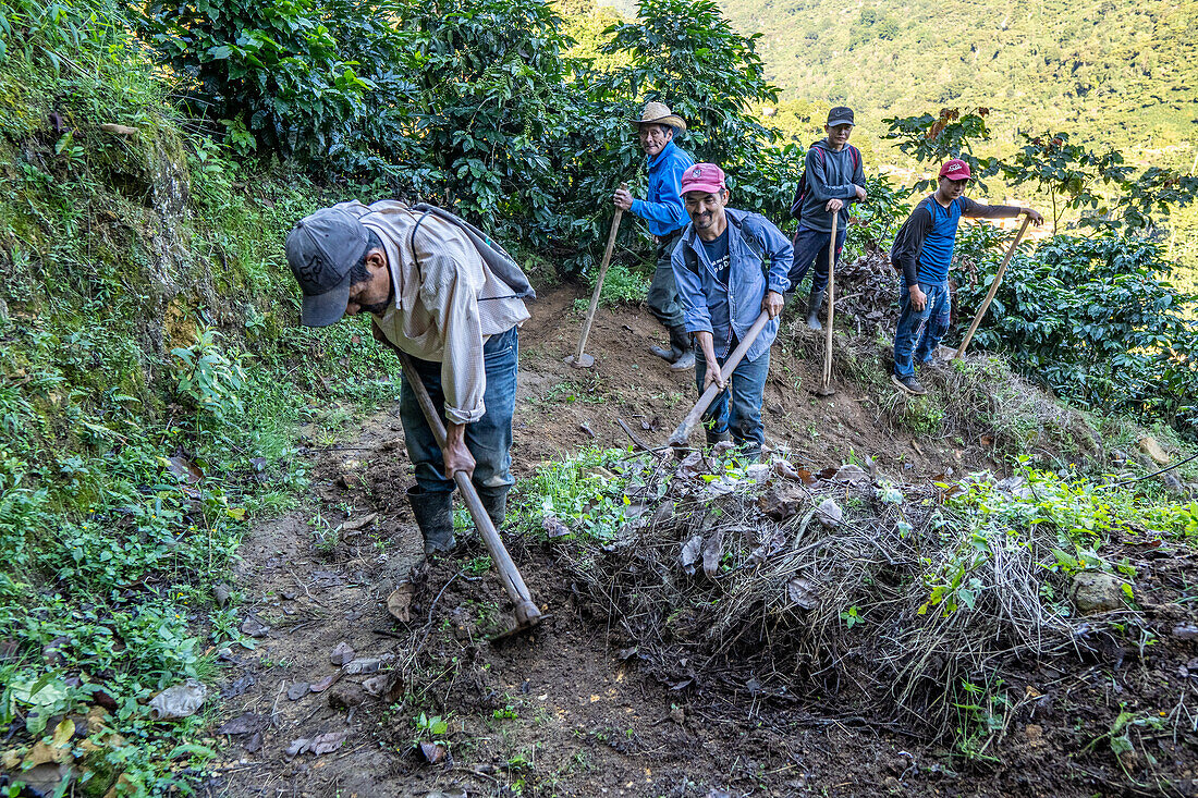 Farmers fixing the road in Hoja Blanca, Huehuetenango, Guatemala