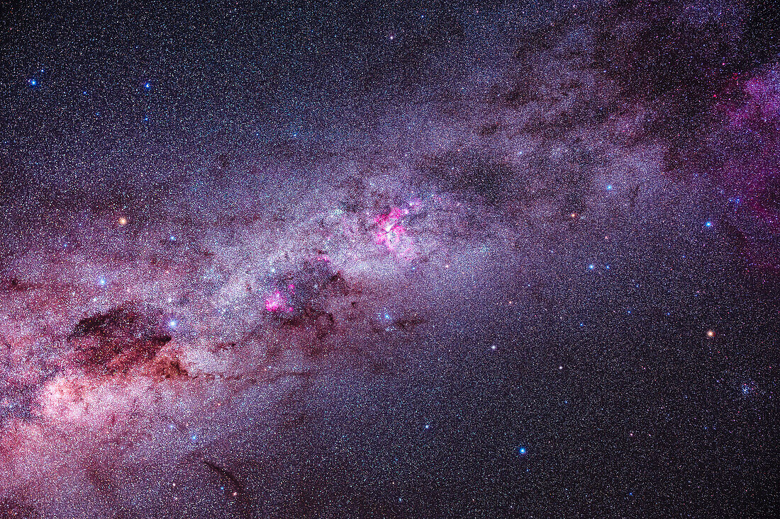 This is a framing of the southern Milky Way from the Southern Cross, Crux, at left, to the False Cross, with its stars in Vela and Carina, at right. In between is a third though upside-down cross, defined by stars in Carina, with blue Miaplacidus as the lower star of this cross.