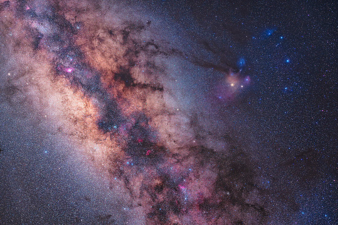 There's no richer and more colourful area of the sky than this field encompassing the Galactic Center in Sagittarius at left and the constellation of Scorpius seen in full here at centre and at right. The Dark Horse prances at top with dark tendrils of dust r.eaching down to yellow Antares and the colourful emission and reflection nebulas of the Rho Ophuichi area.