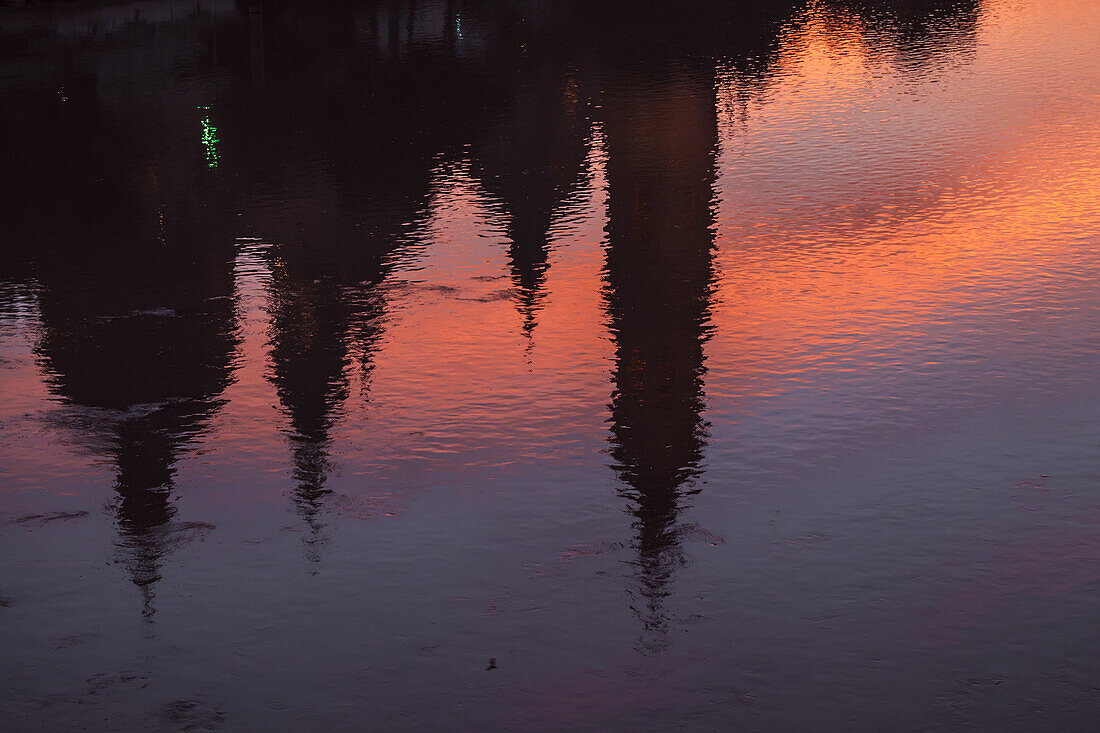 Cathedral-Basilica of Our Lady of the Pillar and the Ebro River bank at sunset, Zaragoza, Spain