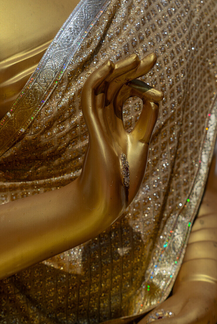 Golden  hand detail at Wat Suthep (Wat Phra That Doi Suthep), historical Buddhist temple, in the forest above Chiang Mai, Thailand, Southeast Asia, Asia