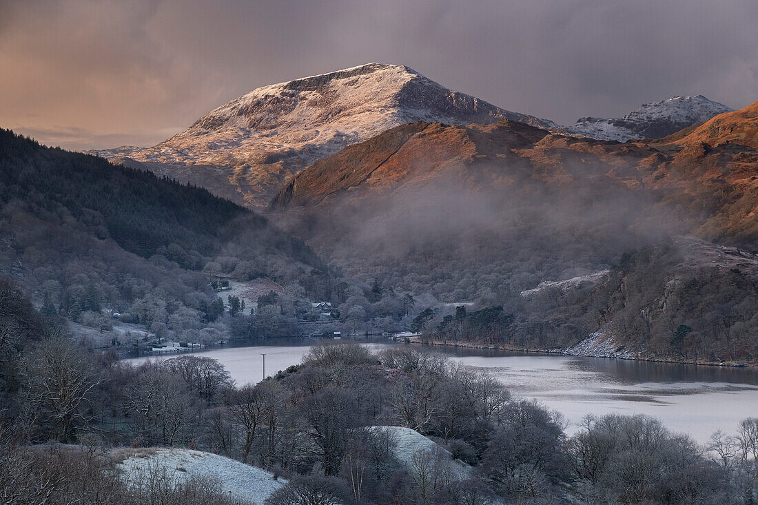 Moel Hebog over Llyn Gwynant in winter, Nant Gwynant, Snowdonia National Park (Eryri), North Wales, United Kingdom, Europe