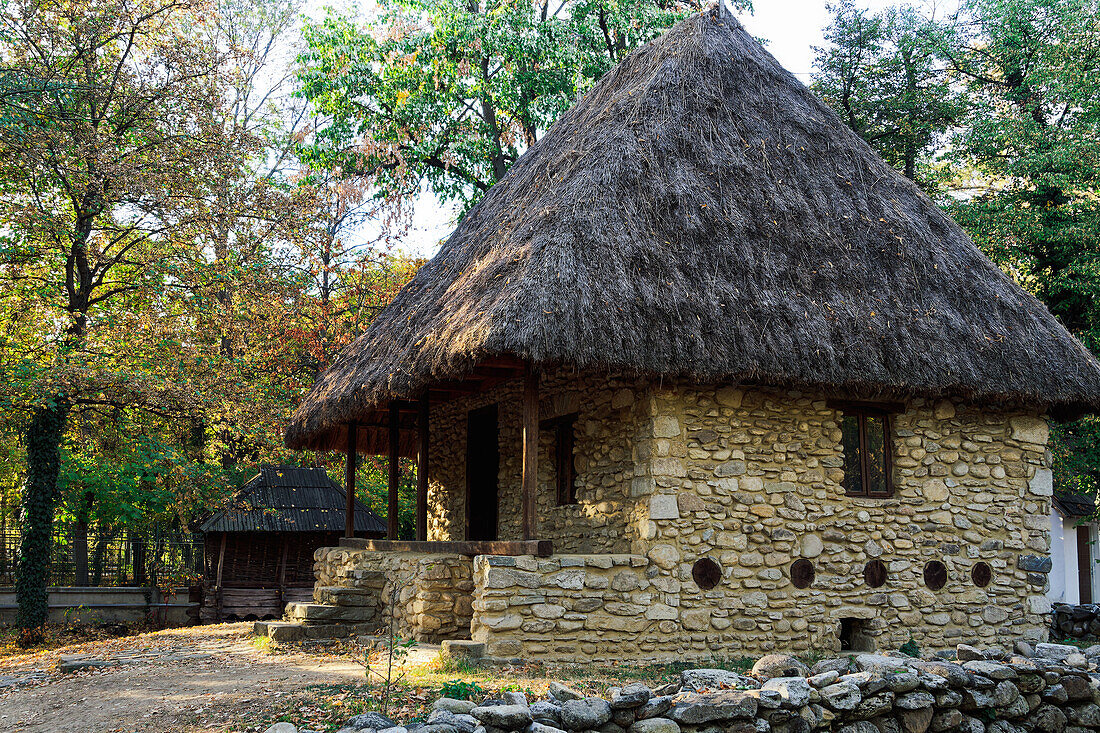 Authentic peasant settlements exhibiting traditional Romanian village life inside Dimitrie Gusti National Village Museum, Bucharest, Romania, Europe