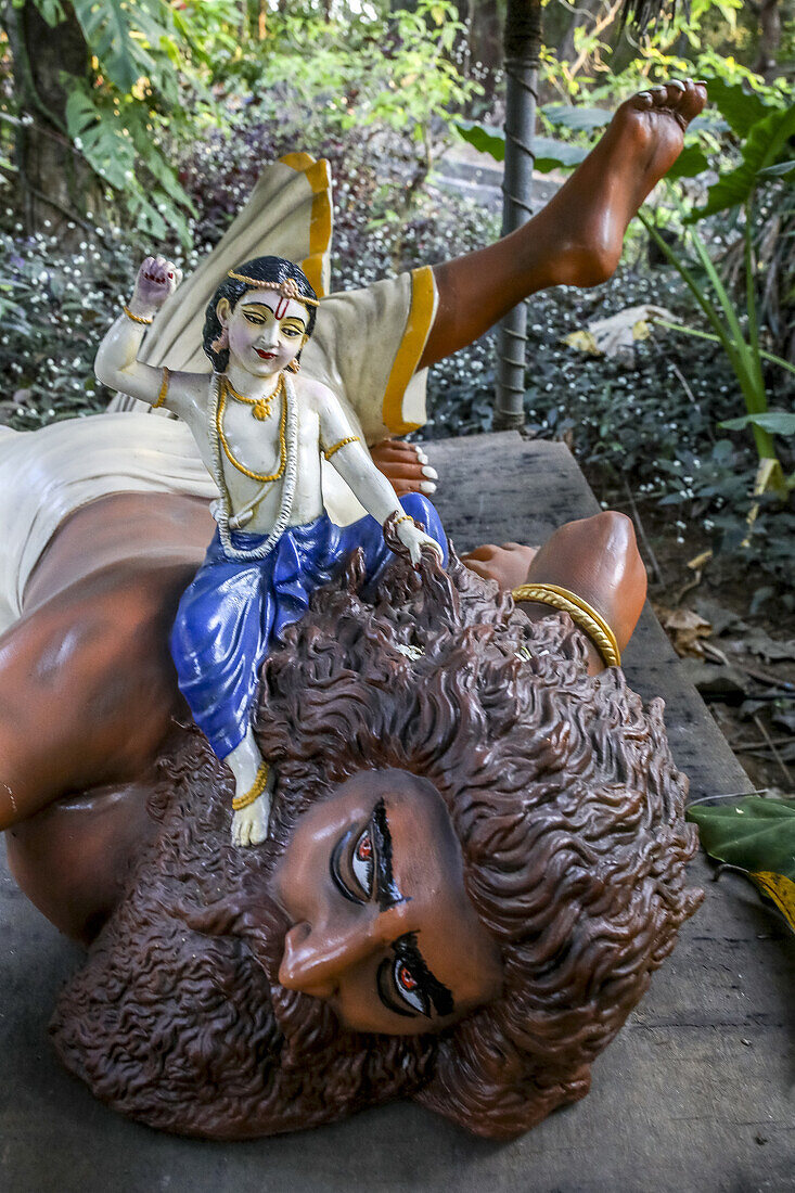 Liberation of Pralambasur, Krishna killing the Demon Pralambasura, Murthis (statues) in Govardhan Ecovillage, Maharashtra, India, Asia