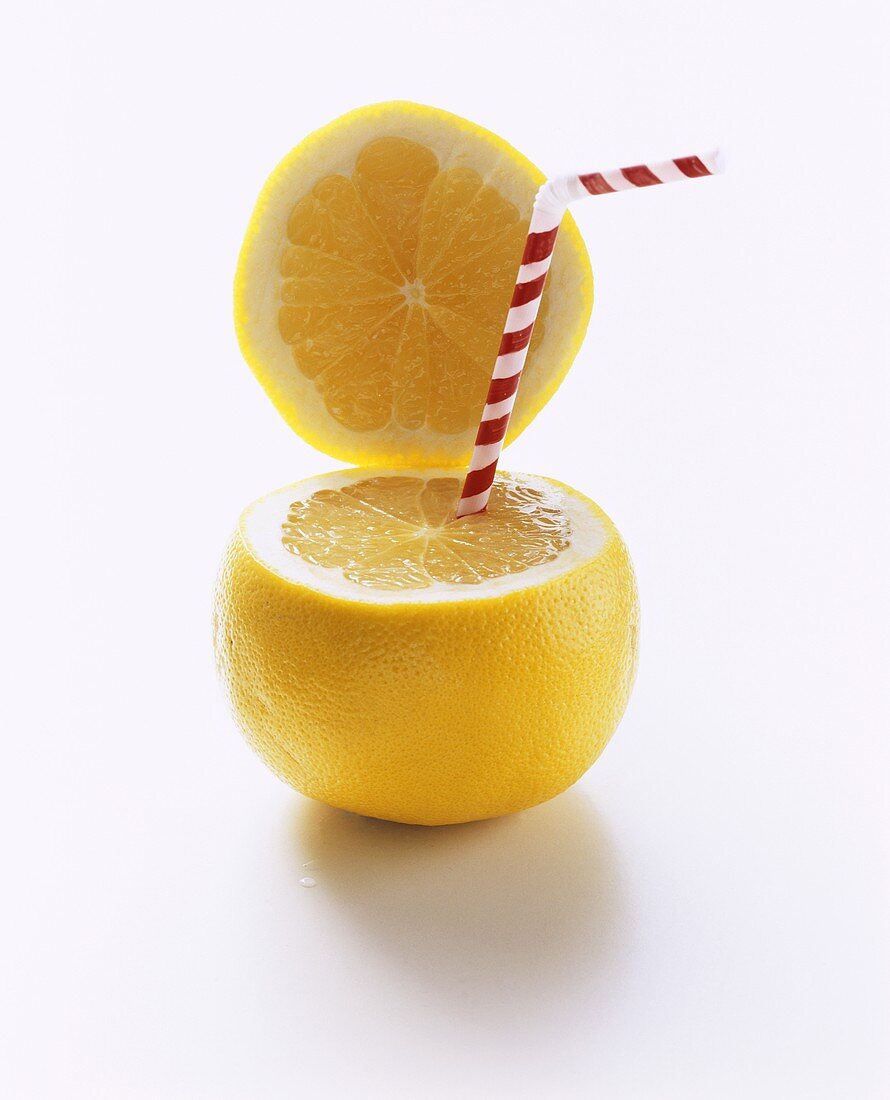 Grapefruit with Top Sliced and Straw Inserted