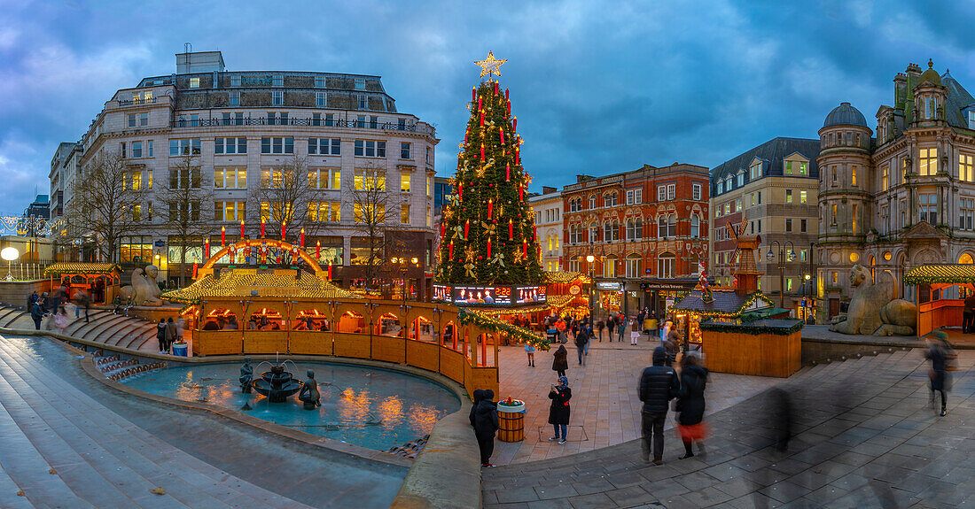 View of Christmas Market stalls and Christmas tree in Victoria Square, Birmingham, West Midlands, England, United Kingdom, Europe